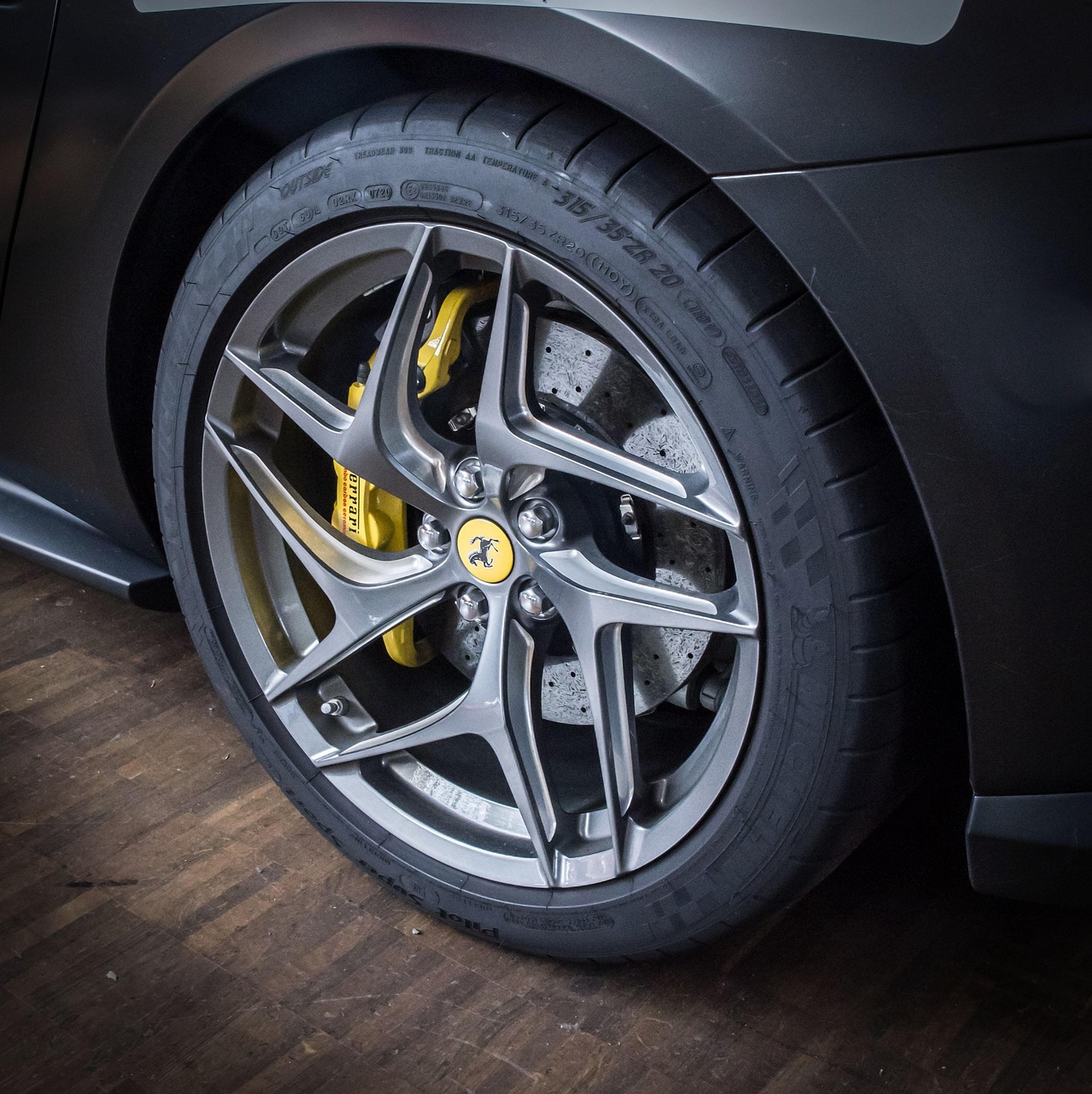 Close-up of a black alloy wheel