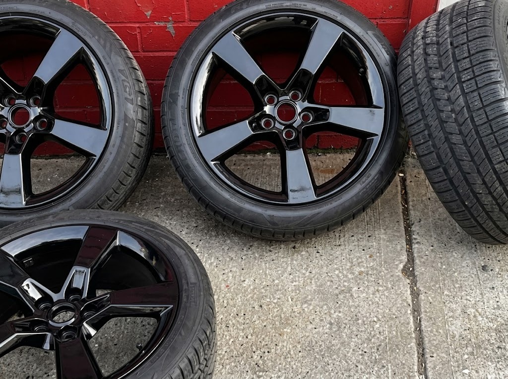 Gloss black alloy wheels fitted with new tyres